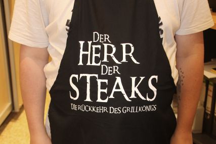 Grillschürze „Der Herr der Steaks - Die Rückkehr des Grillkönigs“