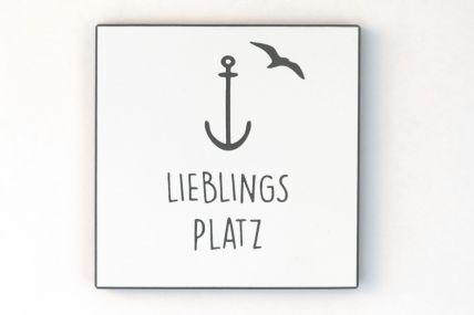 Wandbild in schwarz/weiß in schöner Grafik ein Anker, eine Möve und in schöner Handschrift - Lieblingsplatz.
