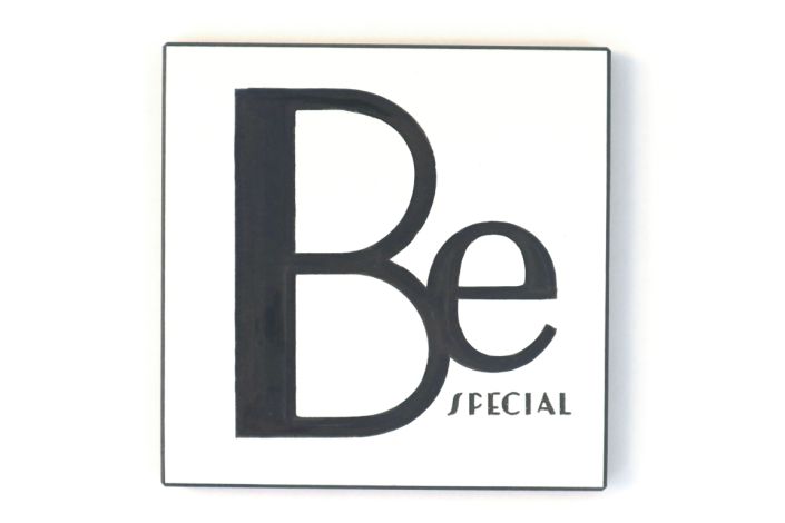 Wandbild in schwarz/weiß - mit schöner Schrift - Be Special.