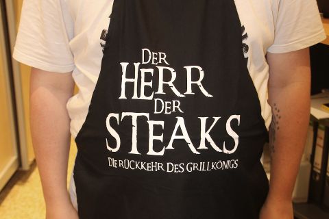 Grillschürze „Der Herr der Steaks - Die Rückkehr des Grillkönigs“